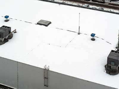 Top view of a typical flat white commercial rooftop